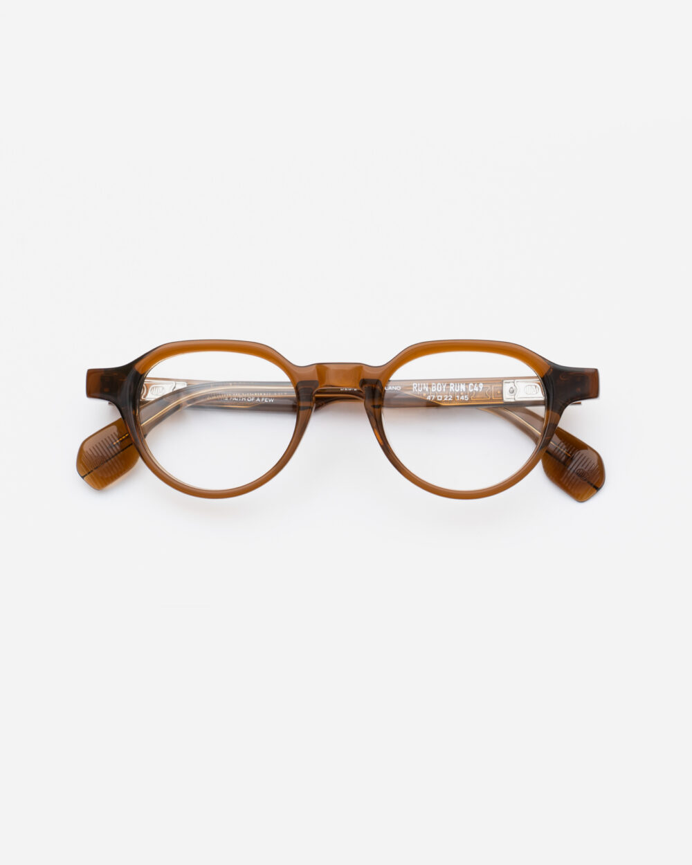 RUN BOY RUN eyeglasses amber Eyewear by Uniquedesignmilano