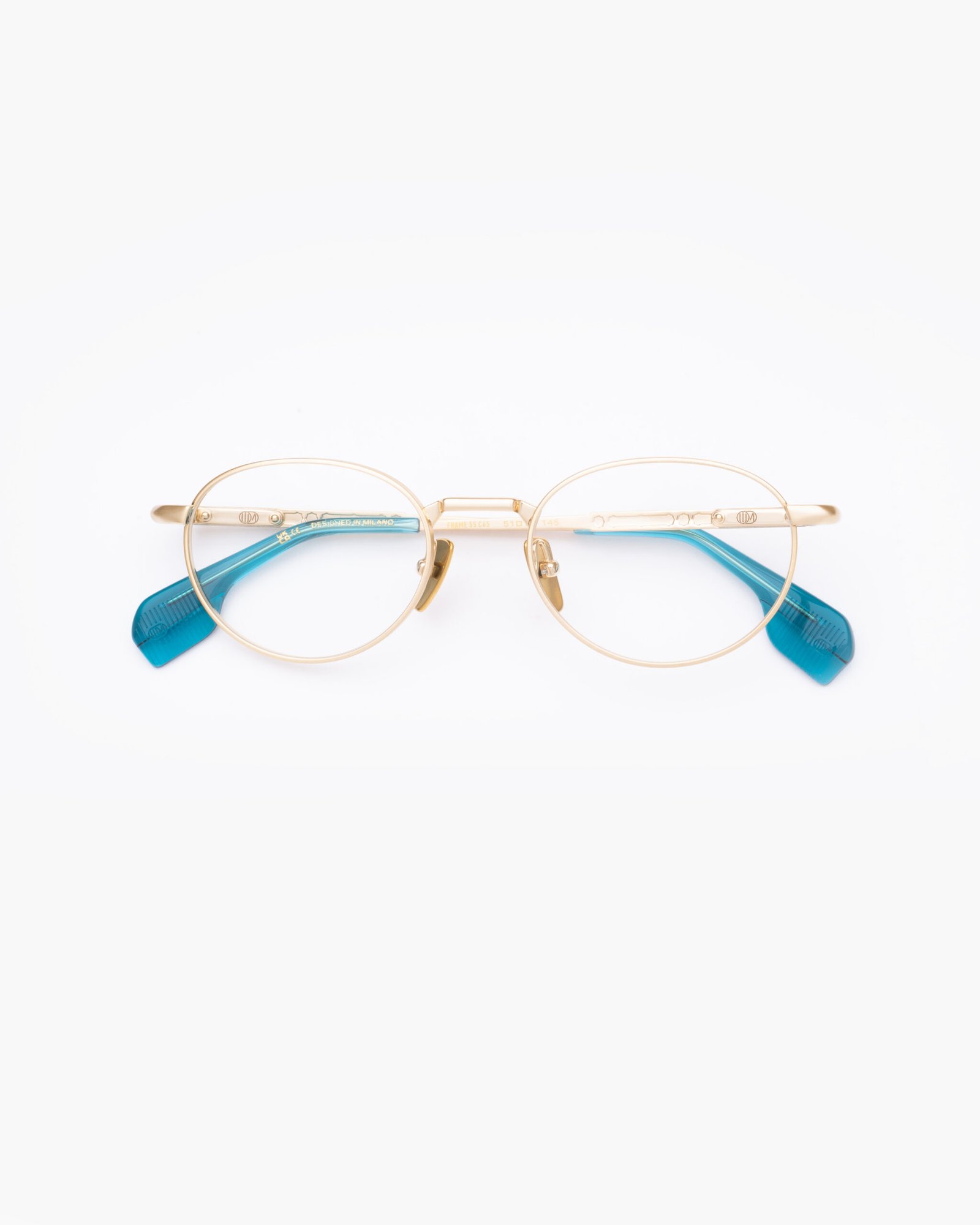 FRAME55 titanium shiny gold aqua optical eyewear by Uniquedesignmilano